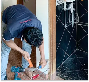 Worker dismantling Wooden Frame process