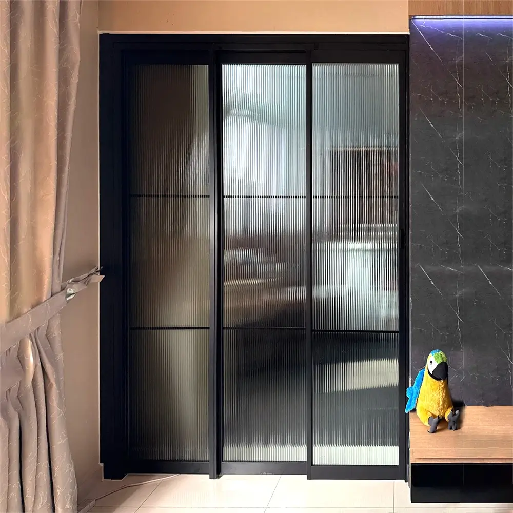#10 Black Top Hung Aluminium Framed 3 Panel Folding Door (VG2622) with Slide to Fold System and Classy Invisible VG Hinge in Design L with Panel A: Design Glass LCG Laminated Safety Clear Glass for Living Room